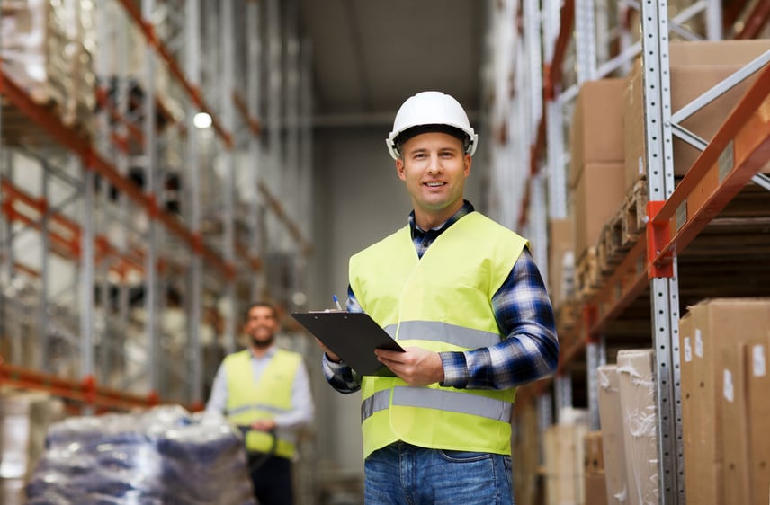 Man with Clipboard in Safety Vest